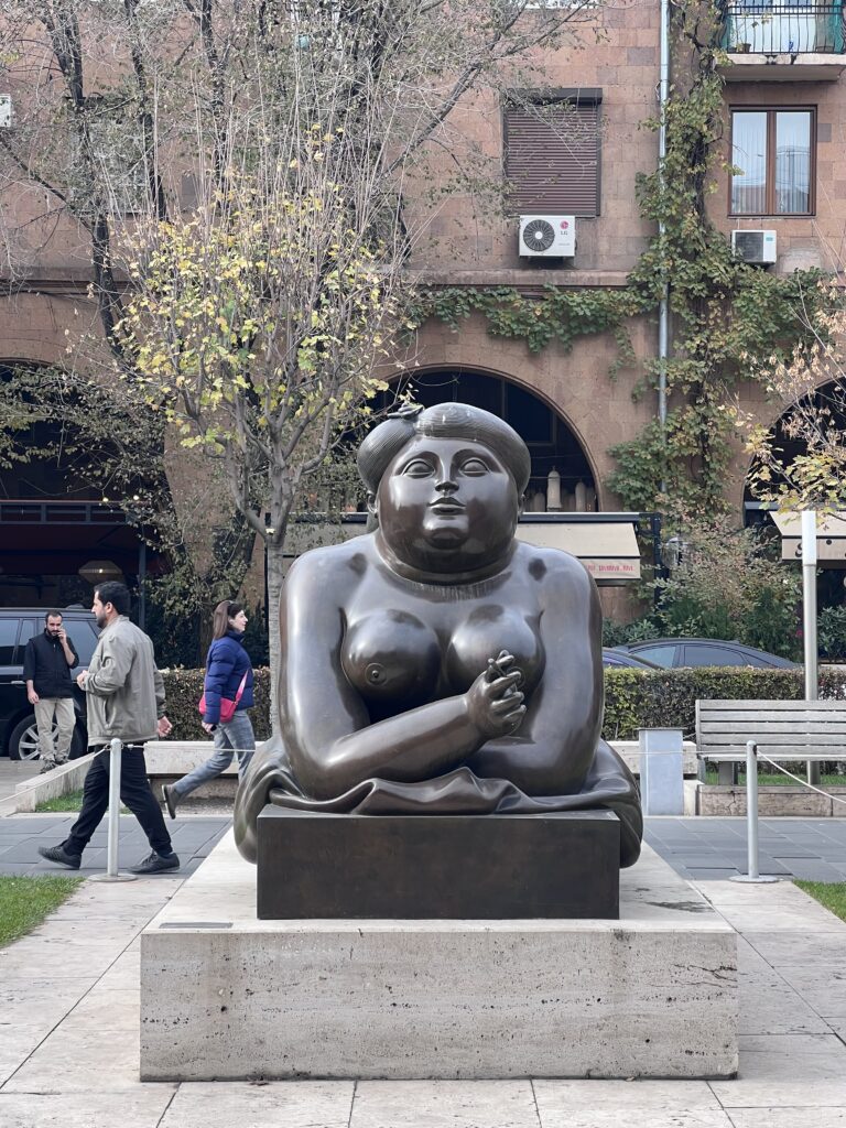 Smoking Woman - Botero Sculpture
